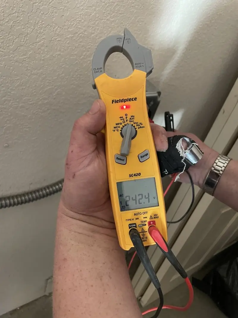Voltage testing with clamp meter during Generator Installation in Palacios